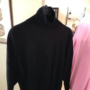 Black turtleneck sweater.